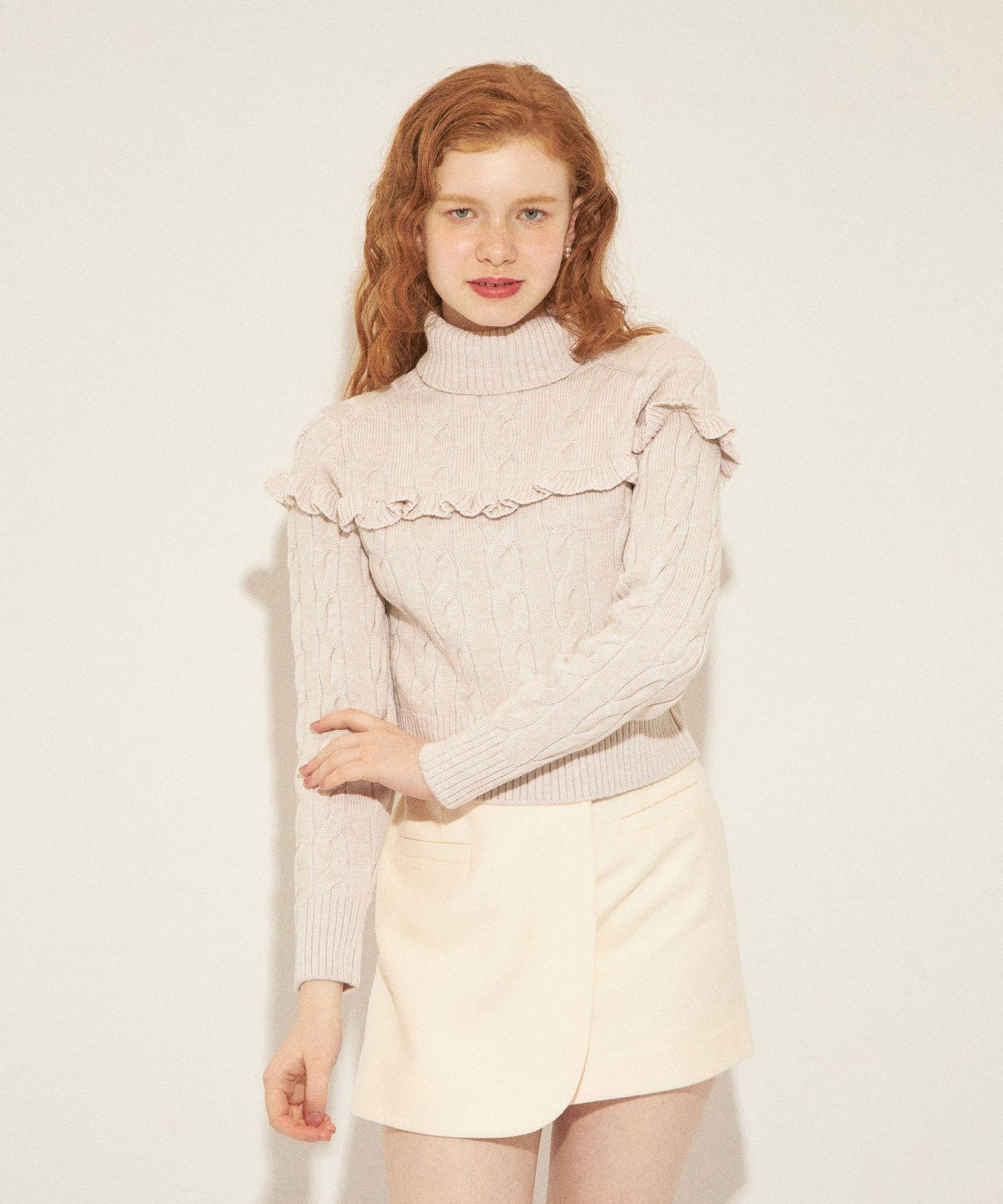 Cable frill high neck knit